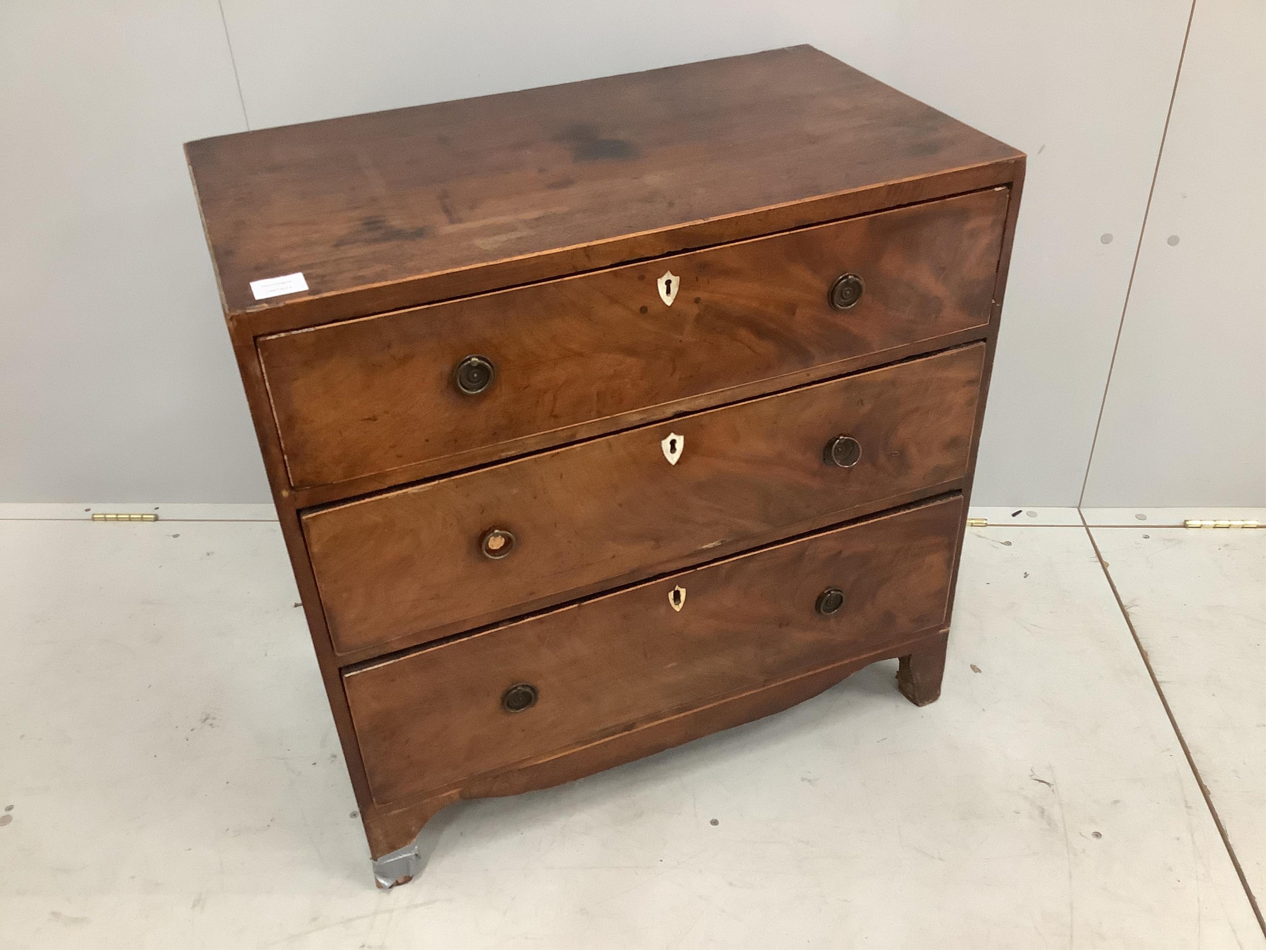 A small George III mahogany chest of three drawers, width 74cm, depth 42cm, height 73cm. Condition - poor
